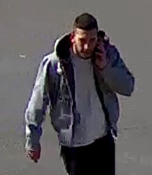 Une photo du suspect prise par une caméra de surveillance du Holiday Inn.