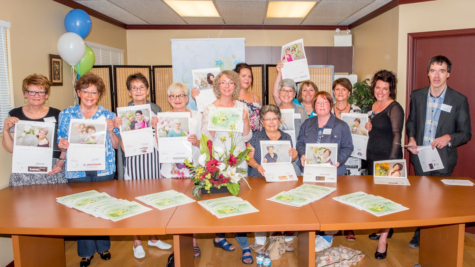 Le Groupe Espérance et Cancer présente son calendrier 2018 à ses nouveaux locaux