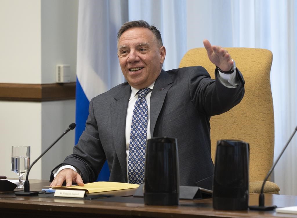 Pas de retour du masque obligatoire à court terme, dit Legault